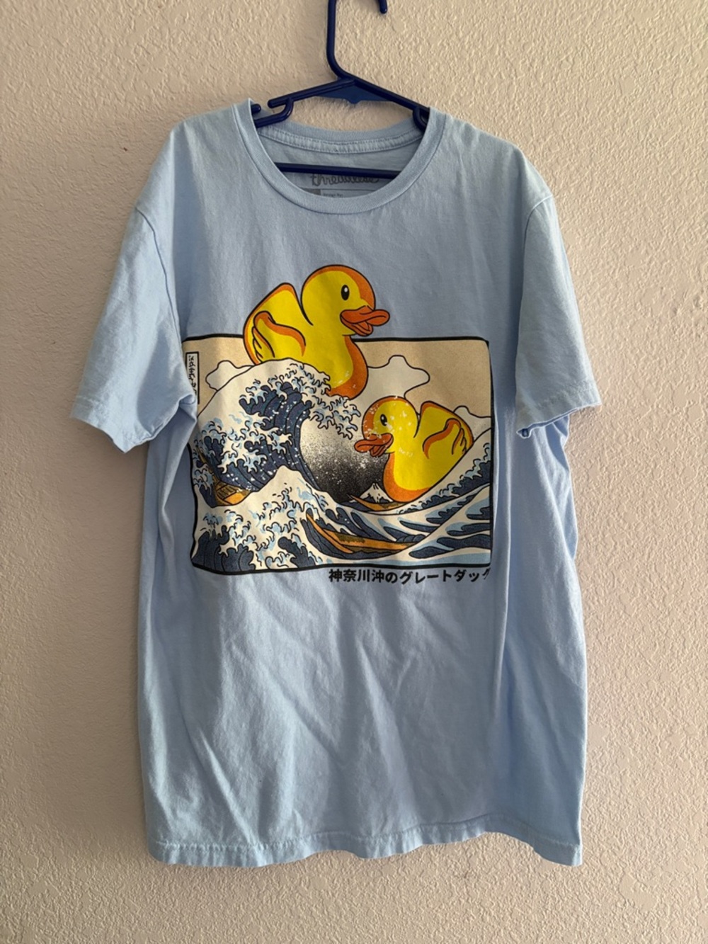 Light Blue Tee with Yellow Duck Wave Graphic
